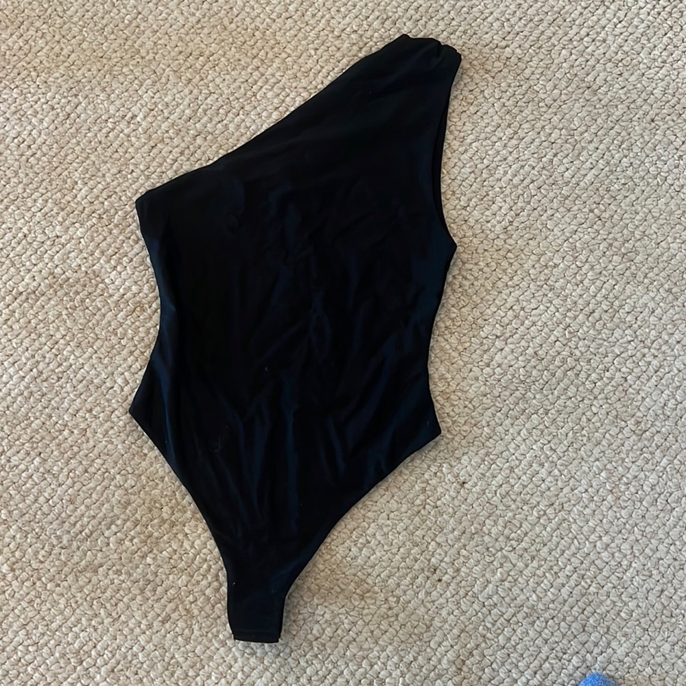 Black one shoulder white fox bodysuit